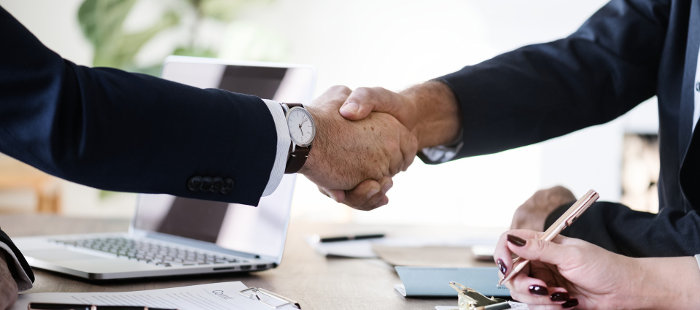 Business Owners Shaking Hands on a Deal